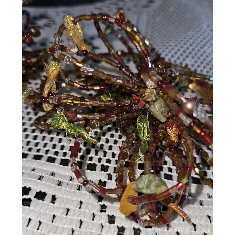 Pier One Set Of 7 Beaded Napkin Rings Fall Starburst Red‎ Brown Green Orange